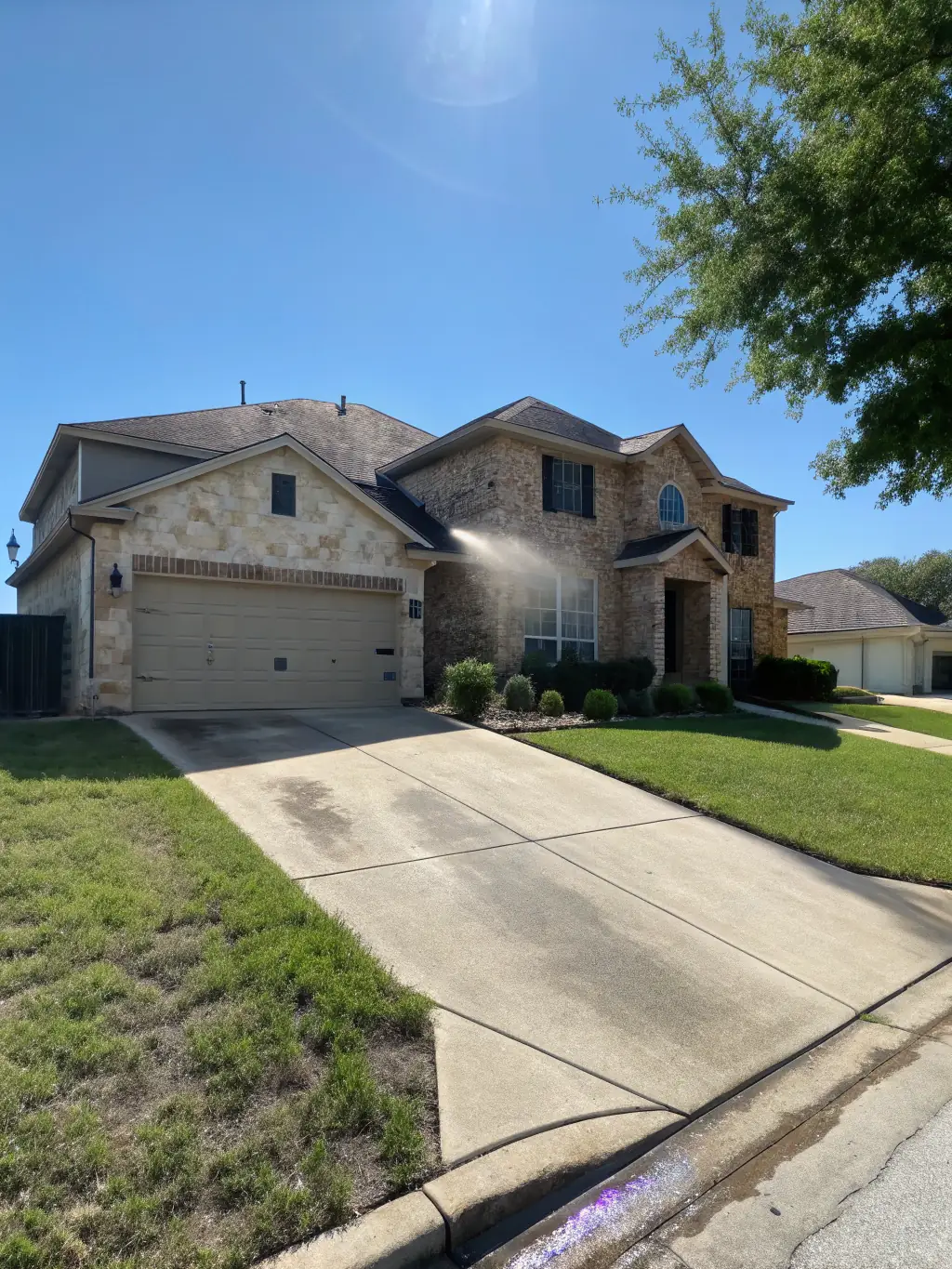 A side-by-side comparison of a house before and after professional washing by Sasquatch Softwash & Property Detailing, highlighting the transformation in Nanaimo, BC.